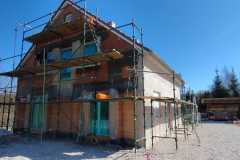 Nowym dom z elewacją wapienną bez cementu.