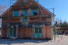 Nowym dom z elewacją wapienną bez cementu.