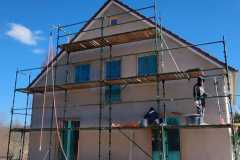 Nowym dom z elewacją wapienną bez cementu.