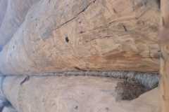 dom_szwajcarski-wyspa_Edwarda-Lepianka-len_w_szczelinach_pomiedzy_belkami-izolacja_lnem-5